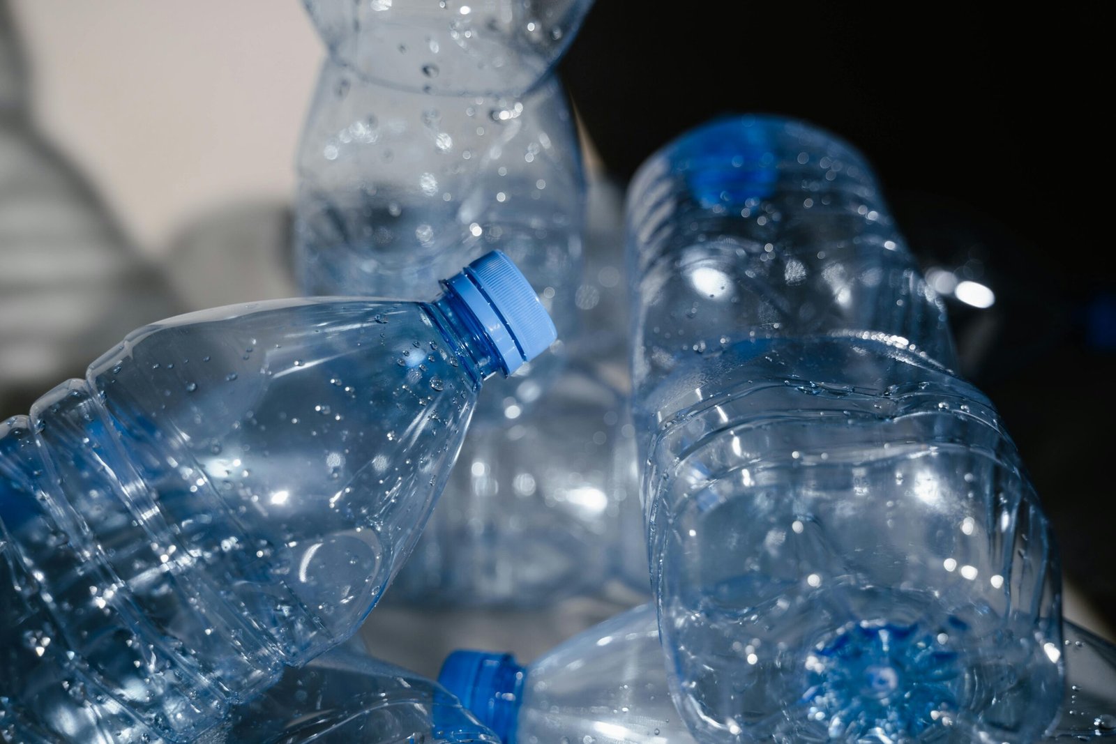 Plastic waste representation image [Photo by MART PRODUCTION: https://www.pexels.com/photo/clear-plastic-bottle-with-blue-lid-7767813/]