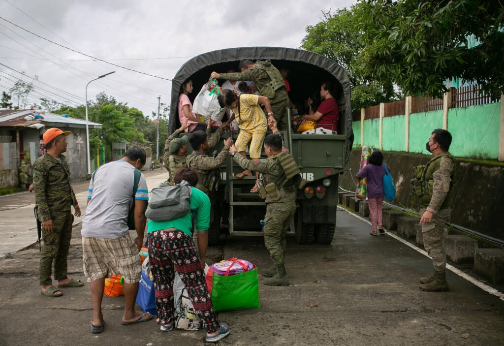 Emergency workers assist residents during pre-emptive evacuations in northern Luzon. [photo credit: Mark Alvic Esplana | Greenpeace]